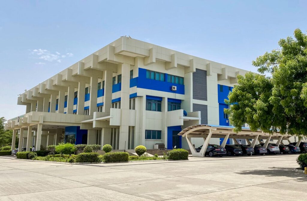 Contemporary building exterior in Katsina, Nigeria under a clear blue sky.